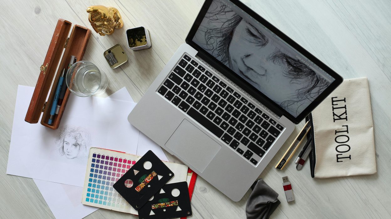 laptop and other accessories on table