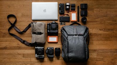 top view photo gadgets on hardwood floor